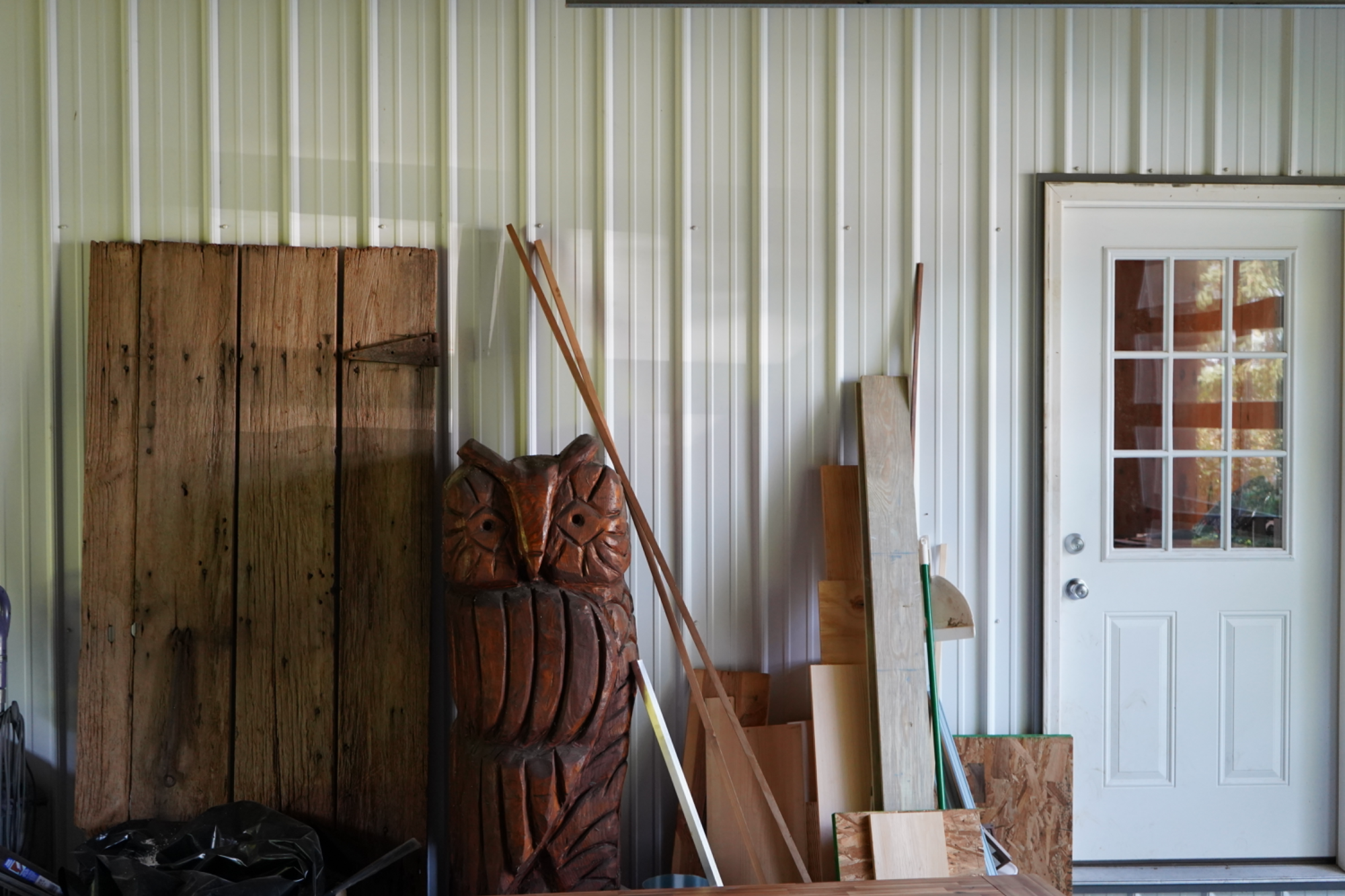 Metal building with owl