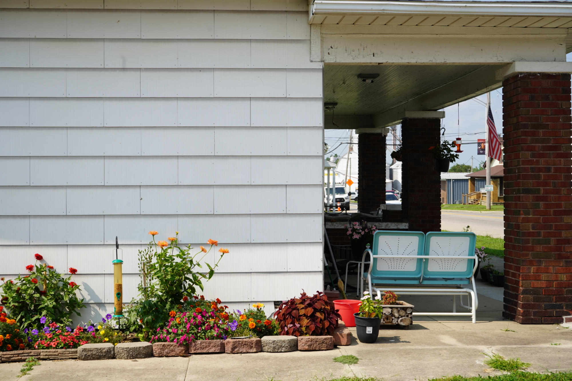 Carport with turquoise bench