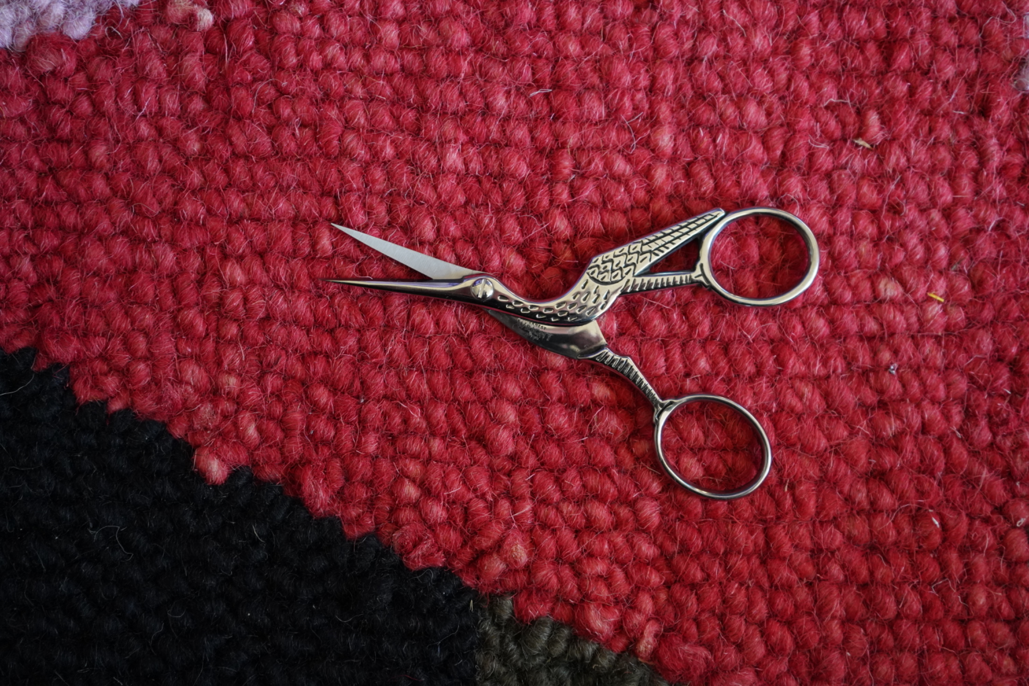 Stork scissors on knit